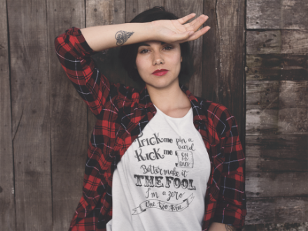 Woman modelling a Braver than Fiction T-shirt.